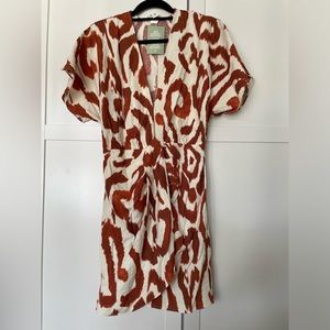 H&M dress in Cream with Brown Patterns.